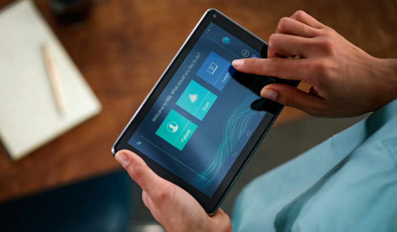 SonoSite iViz tablet interface being used in a clinical setting